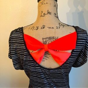 Striped maternity top with orange bow detailing